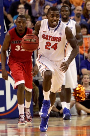 Florida forward Casey Prather drives up the court against Georgia on Wednesday. Prather scored 10 points.