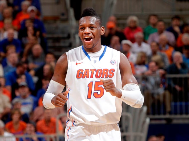 Florida forward Will Yeguete celebrates against Georgia during the first half on Wednesday Jan. 9.