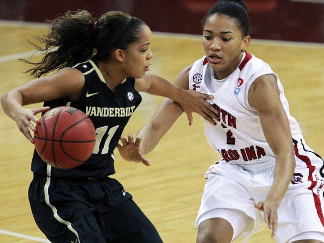 Vanderbilt's Jasmine Lister (11) is defended by South Carolina's Ieasia Walker in the first half on Thursday in Columbia.