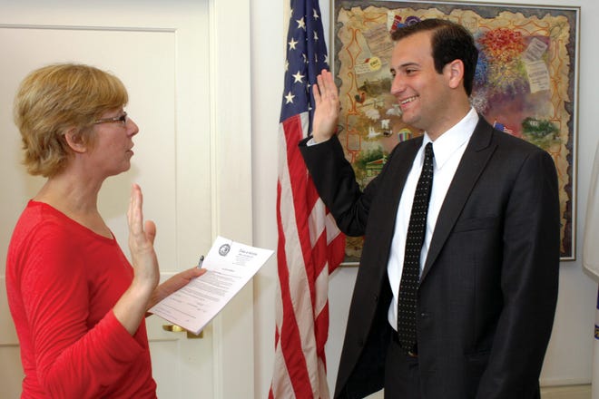 Brian Patacchiola was sworn in by Town Clerk Dawn Michanowicz in the Butterick Building on May 22, the day after the town election.