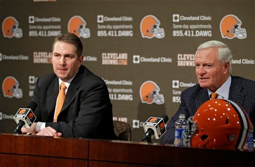 Cleveland Browns owner Jimmy Haslam, right, answers qustions at a news conference announcing Rob Chudzinski, left, as the new head coach.