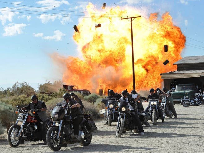 In this file image released by FX, a scene is shown from the FX original series "Sons of Anarchy." Television executives who spoke to the media recently about the tragic shootings in Newtown, Conn., and Aurora, Colo., say the events bothered them, but none offered concrete examples of how it is changing what they put on the air, or if that is necessary. (AP Photo/FX, Prashant Gupta, File)