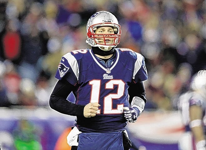 New England Patriots quarterback Tom Brady (12) jogs off the field during the first quarter of an NFL football game against the Miami Dolphins in Foxborough, Mass., Sunday, Dec. 30, 2012. (AP Photo/Elise Amendola)
