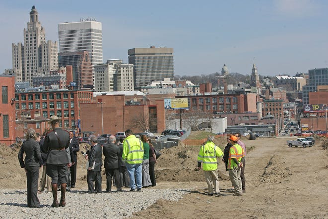 Participants gather last April for a ceremony marking the start of the process to market the former Route 195 land.
