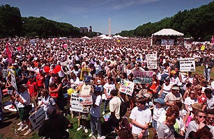May 13, 2000: the "Million Mom March" for gun control assembles on the mall in Washington D.C. to demand enforcement of existing gun laws, and the inclusion of more, such as child safety locks.