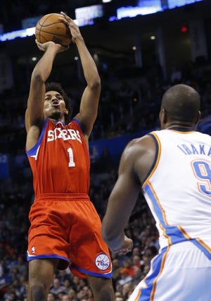 The Sixers' Nick Young (1) shoots over the Thunder's Serge Ibaka during a Jan. 4 game.