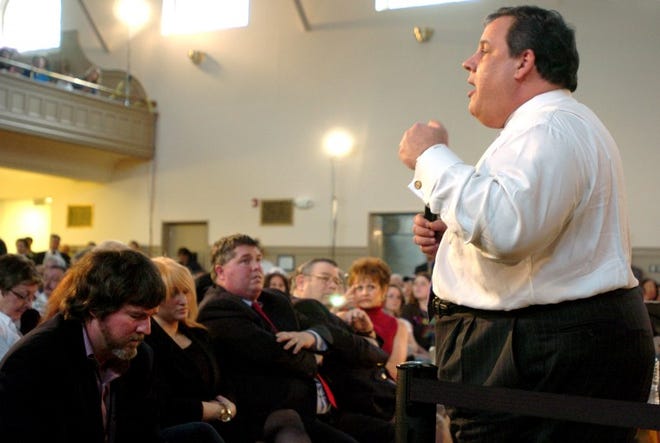 Gov. Chris Christie holds court at a town hall meeting in Florence in 2012. Columnist J.D. Mullane is at the extreme left, taking notes.