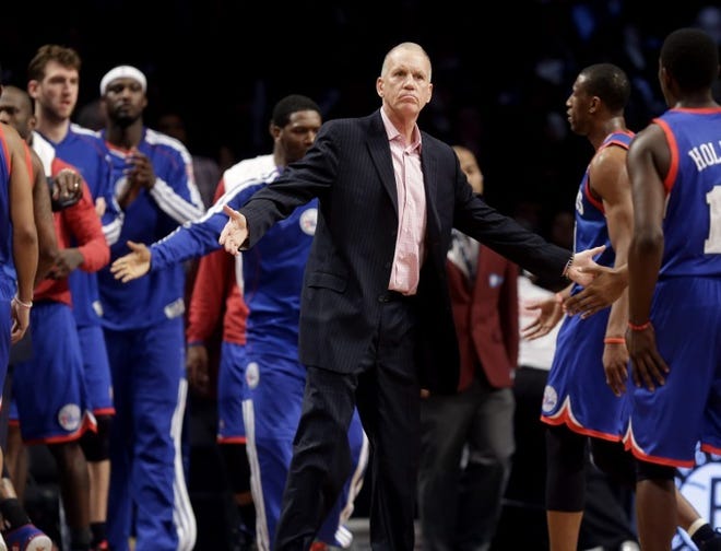 Sixers head coach Doug Collins questions the officials during a Dec. 23 loss to the Nets.