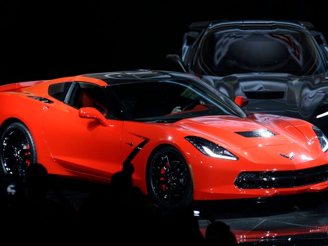The 2014 Chevrolet Corvette debuts in Detroit, Sunday, Jan. 13, 2013. The C7 Corvette debuted before the start of the media previews at the North American International Auto Show. (AP Photo/Paul Sancya)