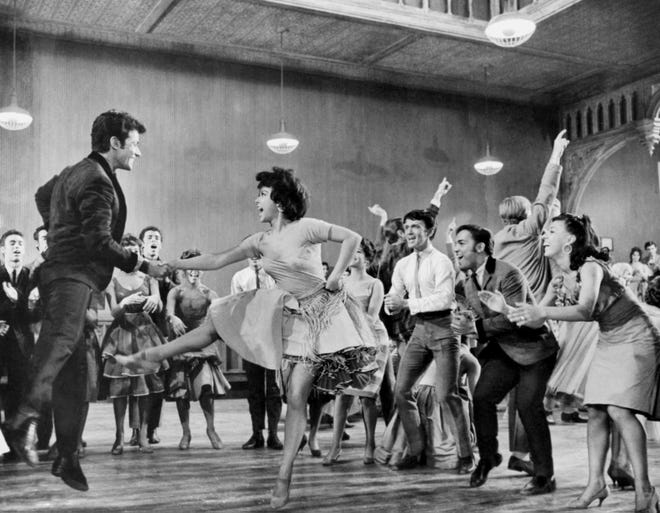 George Chakiris as Bernardo and Rita Moreno as Anita perform in the Mambo dance number in "West Side Story" (1961) during the dance at the gym.