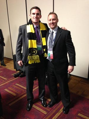 Ryan Finley, left, former BCT Player of the Year at Rancocas Valley High School, and Rancocas Valley coach Damon Petras, at the MLS SuperDraft in Indianapolis. Finley is wearing the scarf of the Columbus Crew, who made him the ninth overall selection.