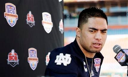 In this Jan. 5, 2013, file photo, Notre Dame linebacker Manti Te'o answers a question during media day for the BCS national championship NCAA college football game in Miami. The wrenching story of Te'o's girlfriend dying of leukemia _ a loss he said inspired him to play his best all the way to the BCS championship _ was dismissed by the school Wednesday, Jan. 16, as a hoax perpetrated against the linebacker.