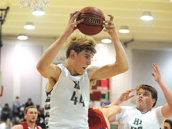 Hokes Bluff's Isaac Haas pulls down a rebound against West End on Friday.
