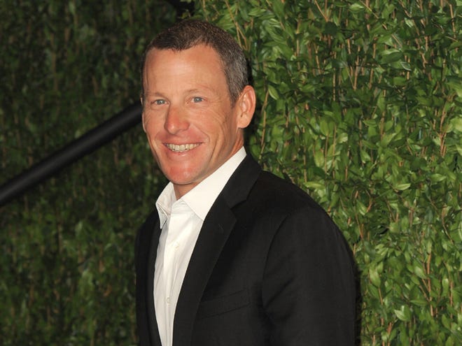 Lance Armstrong arrives at the 2012 Vanity Fair Oscar Party Hosted By Graydon Carter on Feb. 26 at Sunset Tower in West Hollywood, Calif. Paramount Pictures and J.J. Abrams' production company, Bad Robot, are planning a biopic about the disgraced cyclist, a studio spokesperson said Friday, Jan. 18, 2013.
