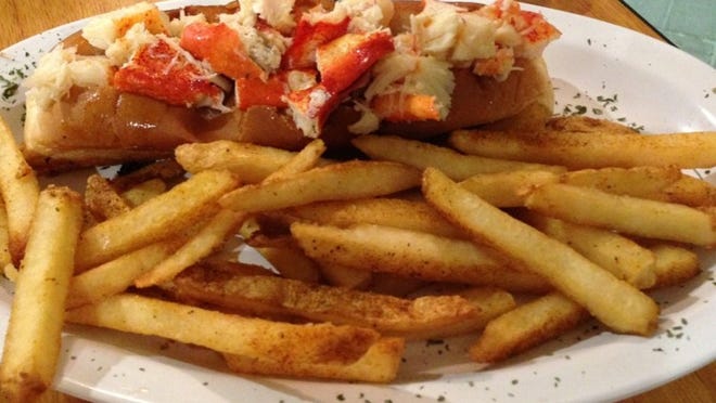 Chowder Heads serves Maine lobster rolls two ways: with the meat lightly sauteed in butter, or chilled and gently tossed with mayo. (Photo by Liz Balmaseda)
