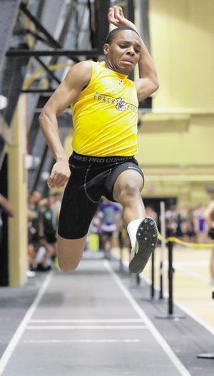 Kingston's Qiyam Green competes in the long jump in the OCIAA indoor track championship meet at West Point on Friday, Jan. 18, 2013.