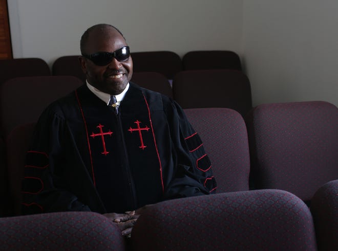 Dr. Rufus L. Wood, Jr. sits for a portrait at the Love Center Missionary Baptist Church in Panama City, Fla. on Sunday.
