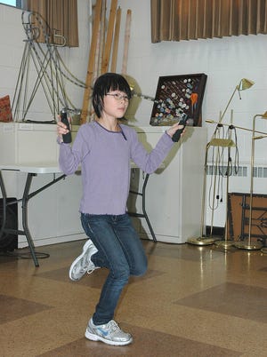 Sydney White jumps rope Thursday afternoon at the Hillsdale First United Methodist Church. White was one of six students at the church's after school program.