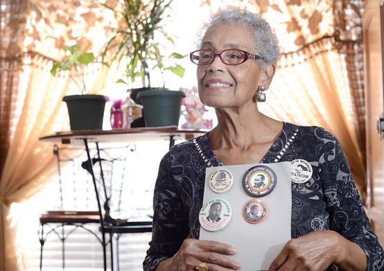 Delilah Marrow holds close the Martin Luther King Jr. buttons she has gathered from various events, including the March on Washington for Jobs and Freedom on Aug. 28, 1963.
