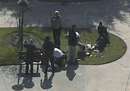 This frame grab provided by KPRC Houston shows the scene at Lone Star College Tuesday, Jan. 22, 2013 as police and emergency personnel work. A shooting at the Texas community college campus wounded at least two people Tuesday and sent students fleeing for safety officials said.