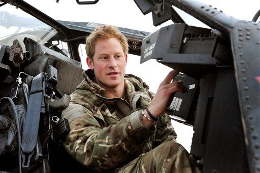 Britain's Prince Harry or just plain Captain Wales as he is known in the British Army, makes his early morning pre-flight checks on the flight-line, from Camp Bastion southern Afghanistan In this photo taken Dec. 12, 2012, made available Monday Jan. 21, 2013. The Ministry of Defense announced Monday that the 28-year-old prince is returning from a 20-week deployment in Afghanistan, where he served as an Apache helicopter pilot with the Army Air Corps.