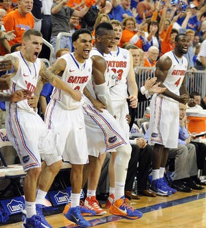 Phil Sandlin Associated Press Florida players cheer on the play of the reserves in the closing minutes of the Gators' win over Missouri.