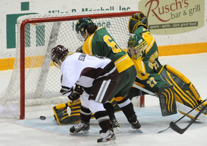Jocelyn Simpson, white jersey, scored Colgate's only goal in a 3-1 loss to Clarkson on Friday night, Jan. 18, at Starr Rink in Hamilton.