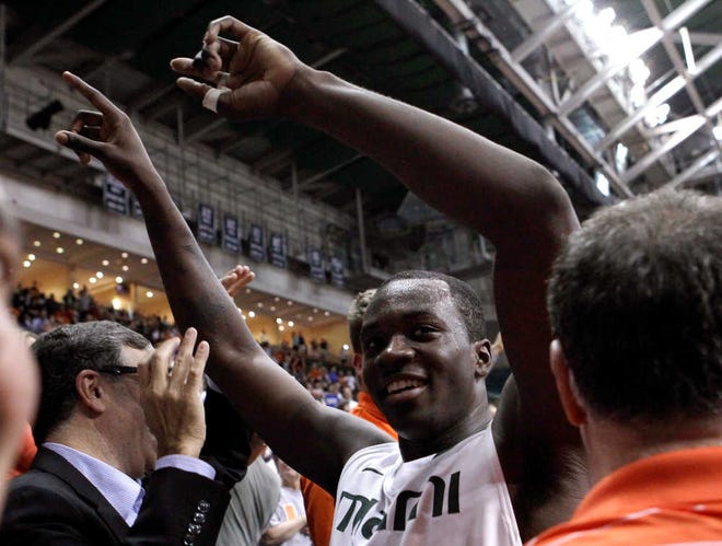 Miami's Durand Scott celebrates Wednesday after the Hurricanes defeated Duke 90-63.