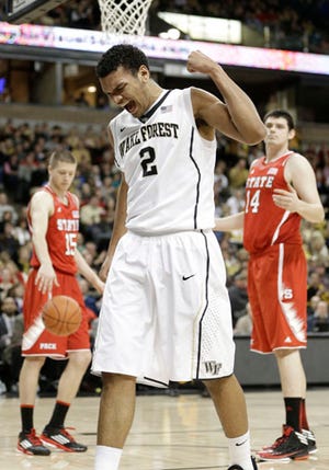 Wake Forest's Devin Thomas reacts after scoring a basket against N.C. State during Tuesday night's game.