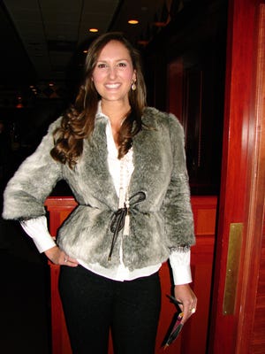 Kelsey McHargue models one of the outfits from W by Worth at the Wine Women & Shoes luncheon last week.