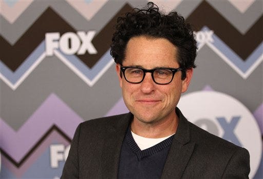 FILE - In this Jan. 8, 2013 file photo, J.J. Abrams arrives at the Winter TCA Fox All-Star Party at the Langham Huntington Hotel in Pasadena, Calif. According to multiple reports, Abrams is set to direct the next installment of “Star Wars,” which Disney has said will be “Episode 7” and due out in 2015. Disney bought “Star Wars” maker Lucasfilm last month for $4.06 billion.