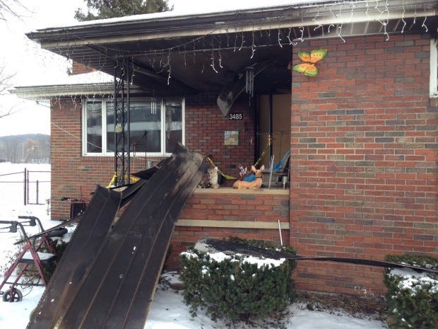 A passerby rescued the female resident of this Darlington home early Sunday, and firefighters rescued a man who was unconscious on the kitchen floor. Fire officials in Darlington said the home was a total loss.