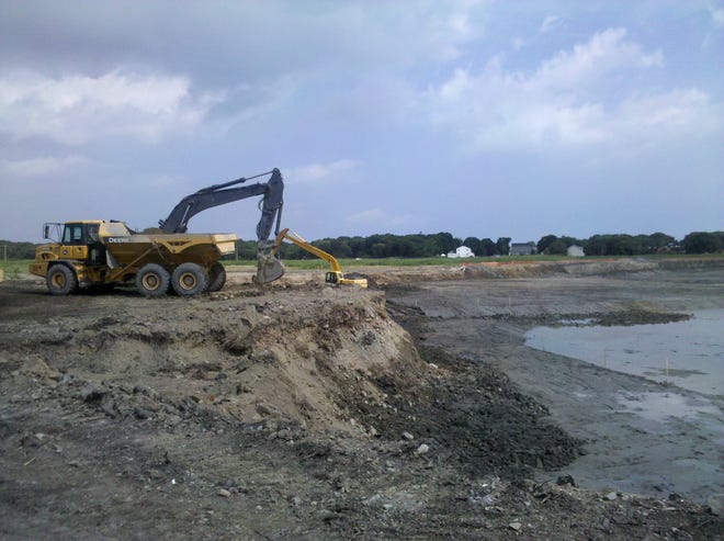 This photo shows excavation during the restoration of the Broad Meadows salt marsh in Quincy.