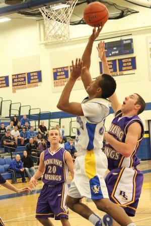 Waynesboro’s Devonte Montgomery takes the ball to the basket during Tuesday’s 52-51 loss to Boiling Springs.