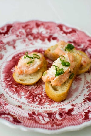 Baked sesame shrimp toasts is a good recipe for Chinese New Year. (AP Photo/Matthew Mead)
