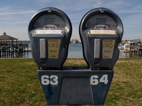 Parking meters sit waiting to be filled along Waynick Blvd at Wrightsville Beach.