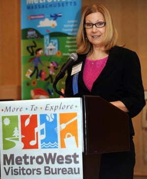 Kathy Quinton of the Wayside Inn and chairwoman of the MetroWest Tourism and Visitors Bureau speaks at the More MetroWest Celebration Breakfast Thursday at the DoubleTree by Hilton Westborough.