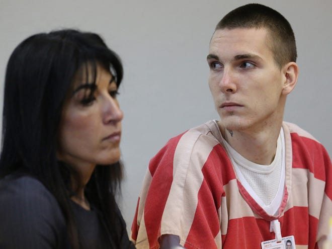 Matthew Gunter, right, looks toward the back of the courtroom as he sits with his defense attorney, Tania Alavi, before being sentenced by Circuit Judge Brian Lambert at the Marion County Judicial Center in Ocala Friday. Gunter was sentenced to 7 years for manslaughter.