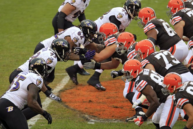 The Baltimore Ravens, left, and Cleveland Browns face off in the second quarter of an NFL football game Sunday, Nov. 4, 2012, in Cleveland.