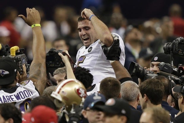 Baltimore Ravens quarterback Joe Flacco (5) is lifted into the air by teammates after defeating the San Francisco 49ers 34-31 in the NFL Super Bowl XLVII football game Sunday in New Orleans.