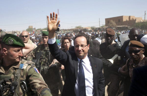 French President Francois Hollande is warmly welcomed in Timbuktu, Mali. He praised French and Malian troops who drove Islamist fighters back into hiding.
