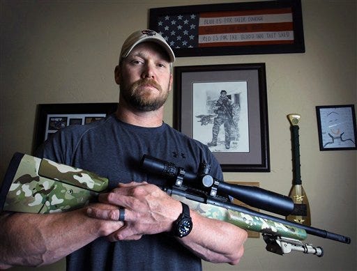 In this April 6, 2012, photo, former Navy SEAL and author of the book "American Sniper", Chris Kyle poses in Midlothian, Texas. A Texas sheriff has told local newspapers that Kyle has been fatally shot along with another man on a gun range, Saturday, Feb. 2, 2013.