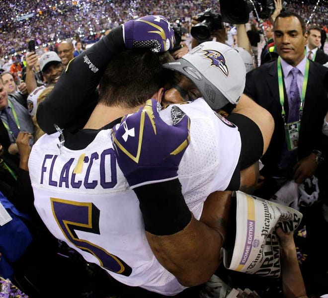 Baltimore Ravens quarterback Joe Flacco (5) celebrates with linebacker Ray Lewis after defeating the San Francisco 49ers 34-31 Sunday in Super Bowl XLVII.