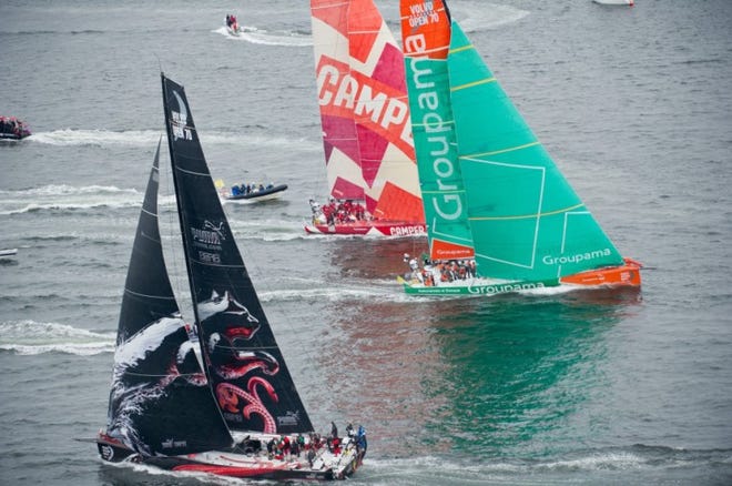 PUMA Ocean Racing (black sails) leads the way during an in-port race in Galway, Ireland, the last stop of the 2011-12 Volvo Ocean Race.