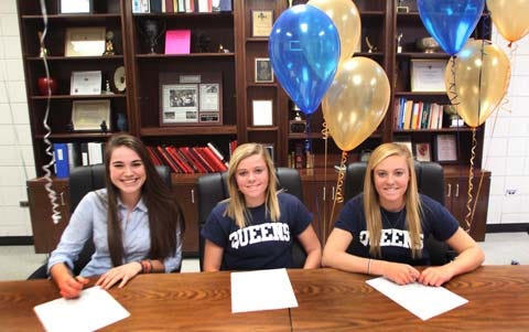 Three New Bern soccer players held their National Signing Day event Wednesday. They will play soccer in college. They are, from left to right: Morgan Young (Southern Virginia University), Shelby Osiecki (Queens University) and Ashley Osiecki (Queens University).