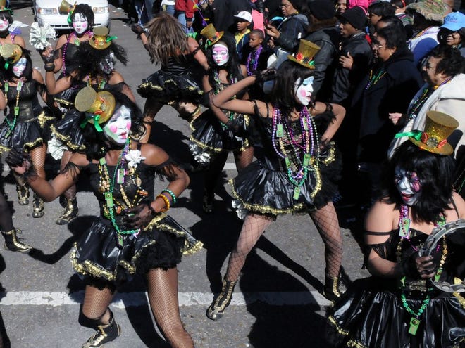 The Baby Doll Ladies perform in the Zulu krewe parade on Mardi Gras in New Orleans. (The Associated Press)