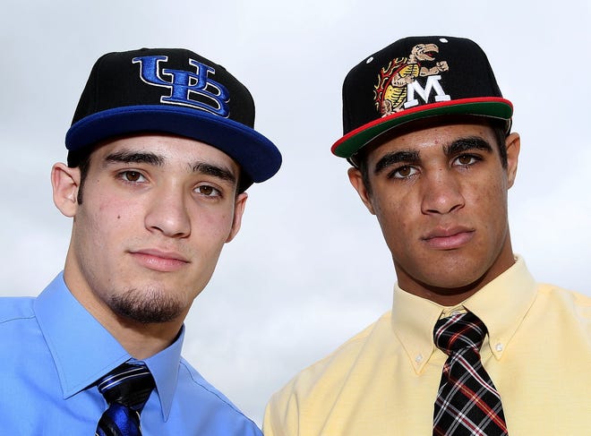 Bozeman's Jacob Martinez signed with Buffalo, while teammate Chandler Burkett decided on Maryland. The duo became the first Division I football signees at the Sand Hills school.