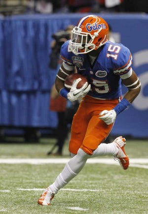 Butch Dill Associated Press Florida defensive back Loucheiz Purifoy (15) was given a notice to appear in court after being charged with a misdemeanor count of cannabis possession.
