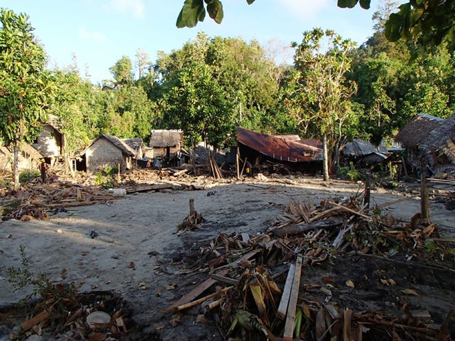 The destroyed Venga village is shown following a tsunami Wednesday in Temotu province, Solomon Islands. The damage seen is part the survey by the assessment crew of the aid organization World Vision.