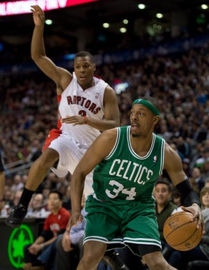 Celtics forward Paul Pierce (34) moves to the basket during the first half of Boston's win over the Raptors on Wednesday night.